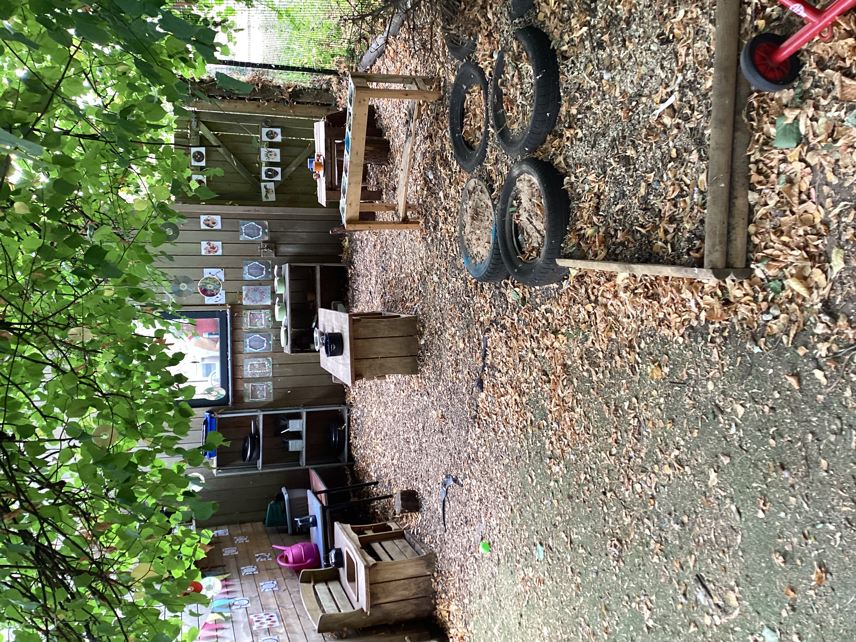 Outdoor play area with mud kitchen